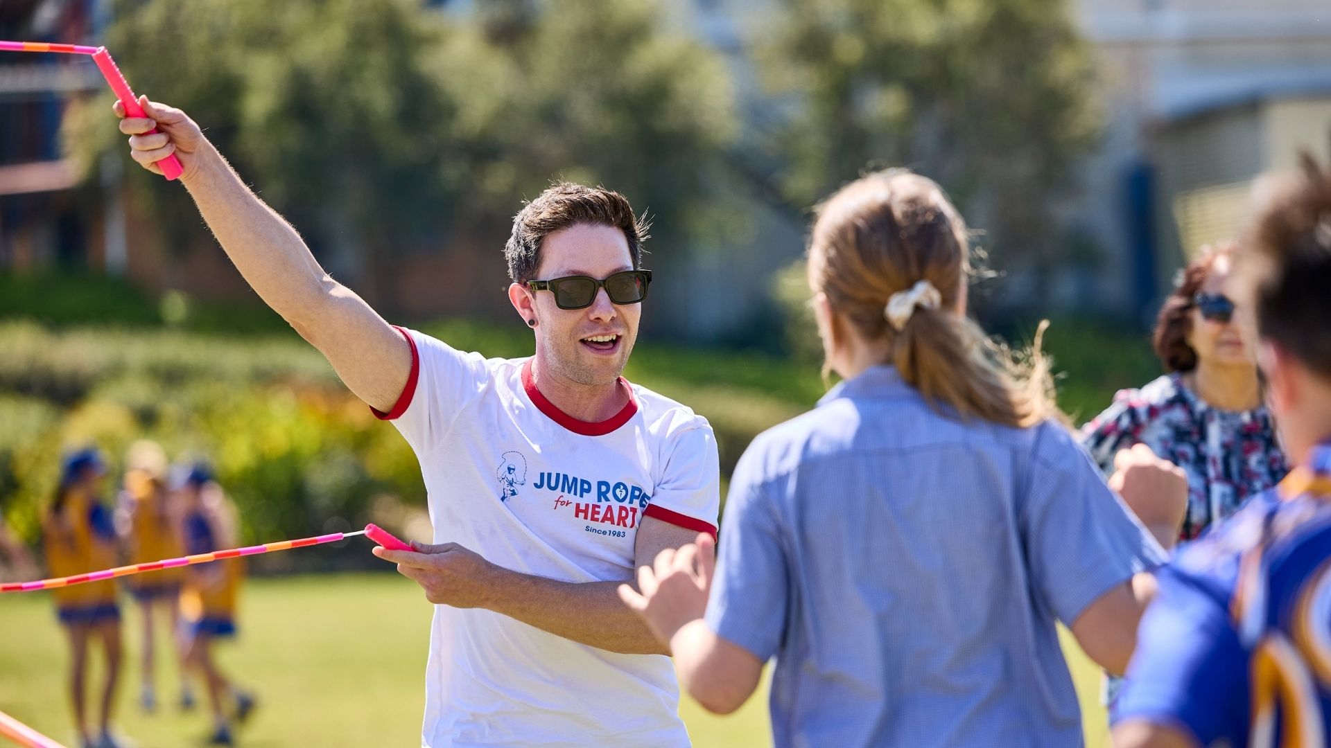 World Skipping Champion Luke Boon turning two long skipping ropes for primary school skipping challenge