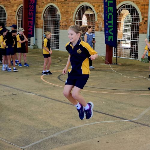 A child skipping rope at Moree Public School