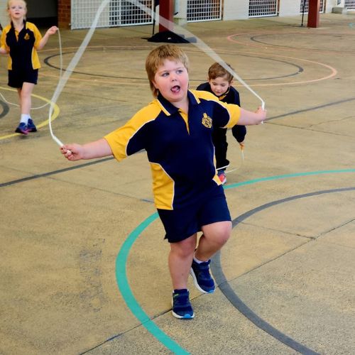 A young boy doing Jump Rope for Heart