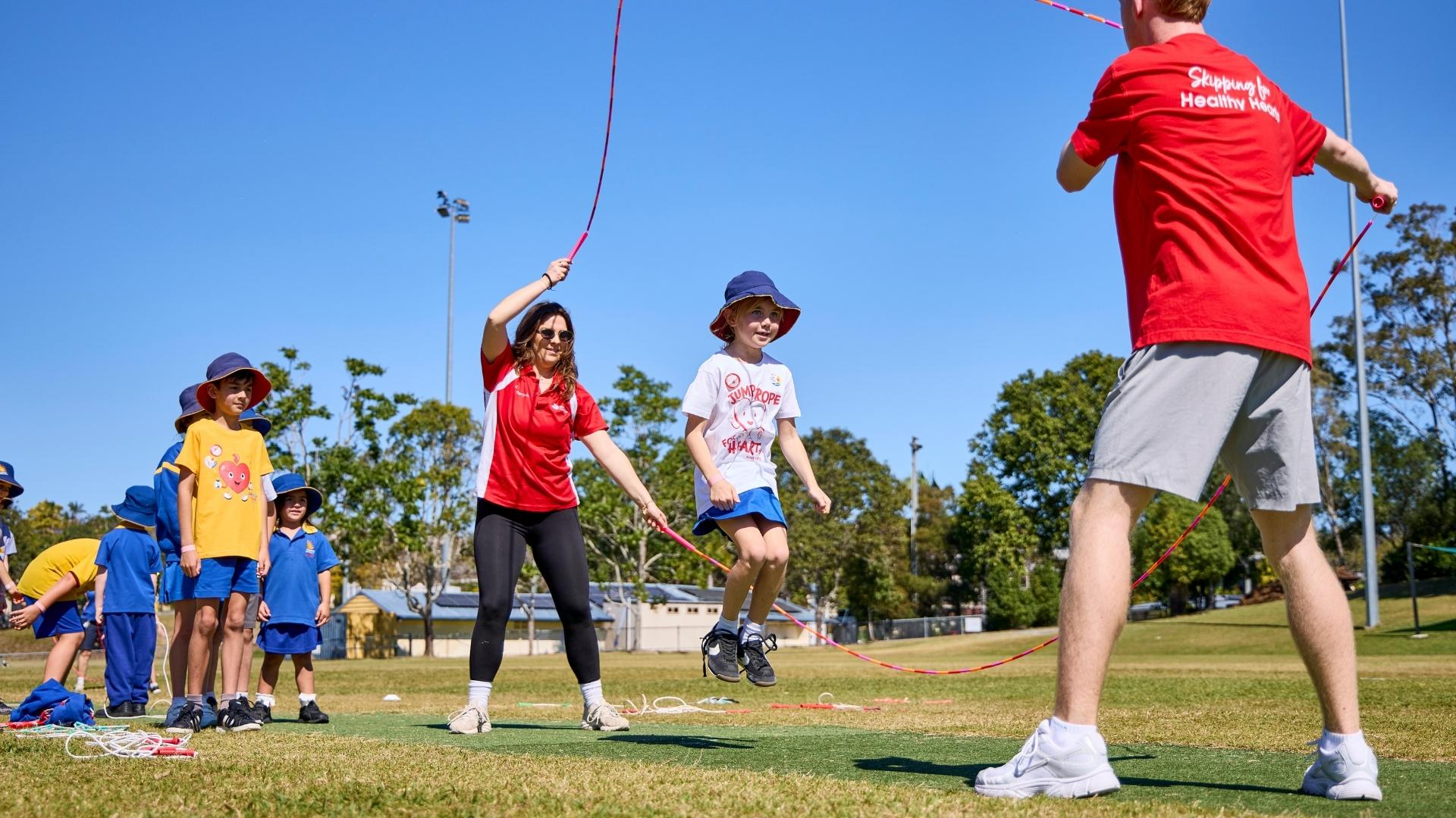 Grace, a Jump Rope for Heart Field Officer, running a skipping session at a primary school